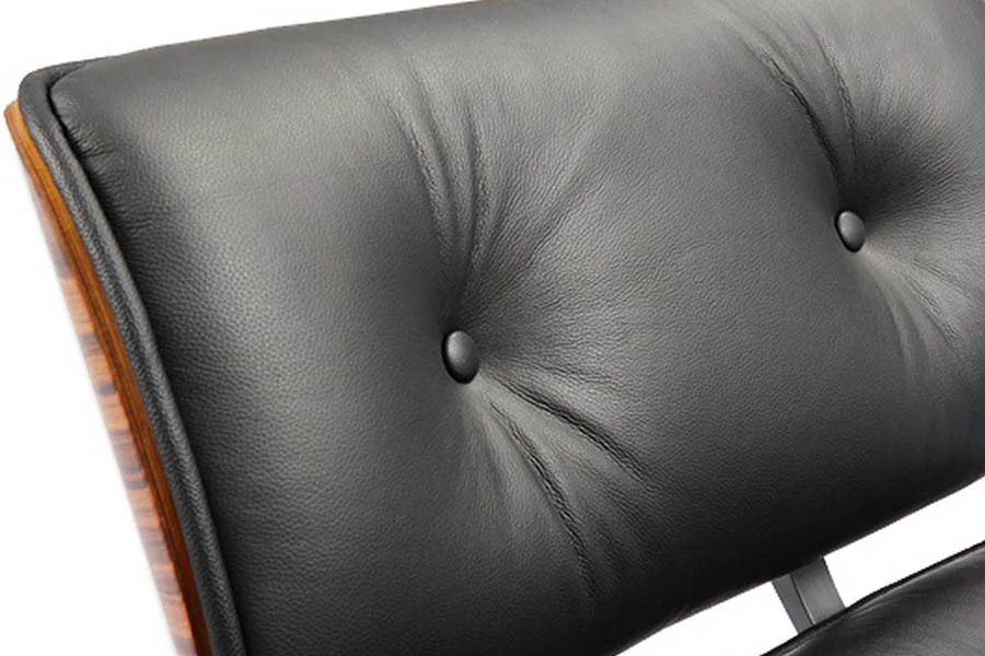 Modern leather lounge chair with storage ottoman